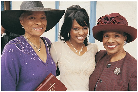 Photo of women wearing wide-brimmed hats.